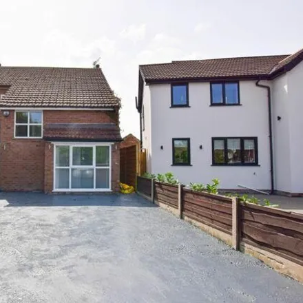 Buy this 4 bed house on Evesham Grove in Sale, M33 2EY