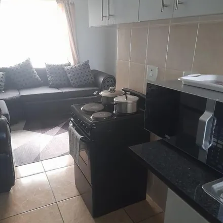 Rent this 2 bed apartment on Siderite Avenue in Fleurhof, Soweto