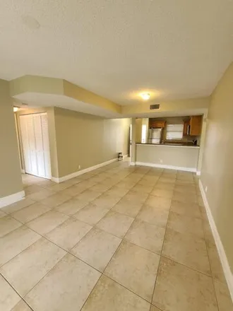 Buy this 3 bed condo on 1648 Windorah Way in Golden Lakes, Palm Beach County