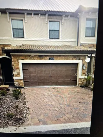Rent this 3 bed townhouse on 1204 Payne Stewart Drive