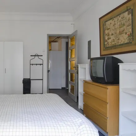 Rent this 4 bed room on Rua Pinheiro Chagas 20 in 1050-180 Lisbon, Portugal