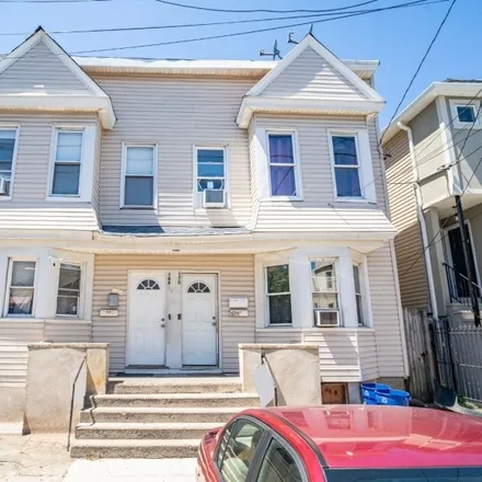 Buy this 8 bed townhouse on 158 Parker Street in Newark, NJ 07104