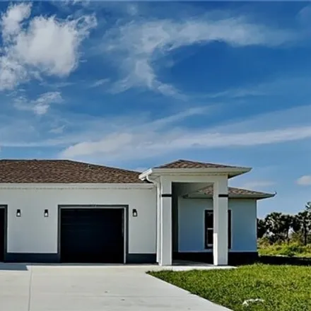 Buy this 6 bed house on 1184 Gordon Avenue South in Lehigh Acres, FL 33973