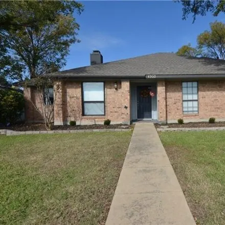 Rent this 3 bed house on 1626 Mayflower Drive in Carrollton, TX 75007