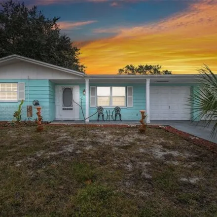 Buy this 4 bed house on 3012 Moog Road in Beacon Square, Pasco County