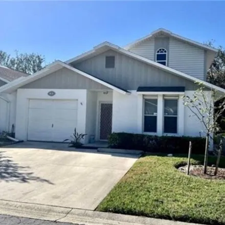 Rent this 3 bed house on Raleigh Lane in Cypress Lake, FL 33919
