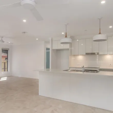 Rent this 4 bed townhouse on Freshwater Street in Torquay QLD 4655, Australia