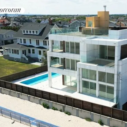 Buy this 5 bed townhouse on 137 Beach 140th Street in New York, NY 11694