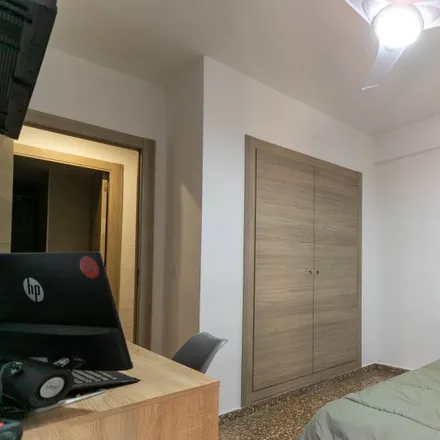 Rent this 4 bed room on Plaça d'Holanda in 46017 Valencia, Spain