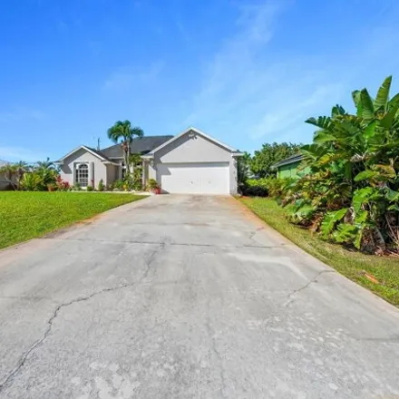 Buy this 3 bed house on 1662 Southwest Victor Lane in Port Saint Lucie, FL 34984