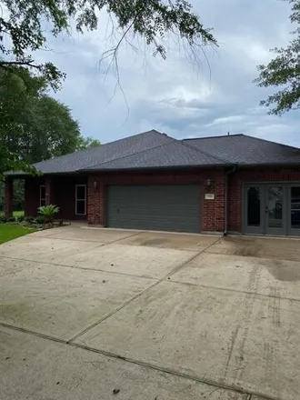 Rent this 4 bed house on 7572 Nickaburr Creek Drive in Montgomery County, TX 77354