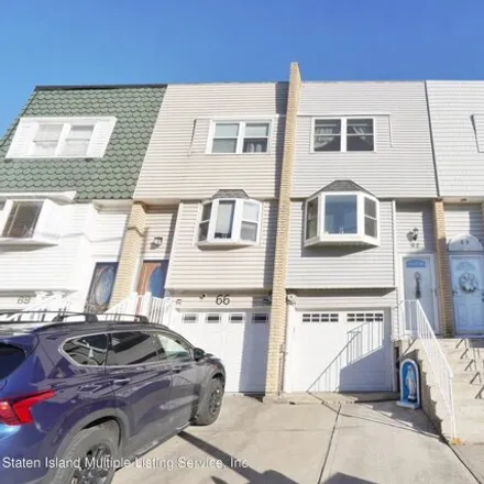 Buy this 3 bed townhouse on 62 Daffodil Court in New York, NY 10312