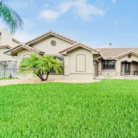 Buy this 3 bed house on 6991 East Wedgewood Avenue in Davie, FL 33331
