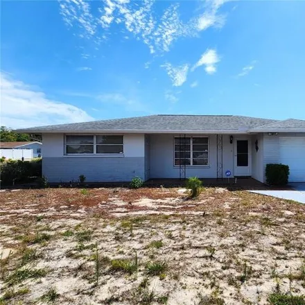 Buy this 2 bed house on Oak Hill Drive in Jasmine Estates, FL 34668