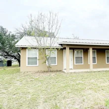 Buy this 4 bed house on 1668 Cemetery Road in Devine, TX 78016