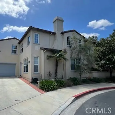 Rent this 4 bed house on 48 Commonwealth in Irvine, CA 92618