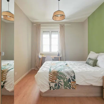 Rent this 6 bed room on Avenida São João de Deus in 1000-009 Lisbon, Portugal