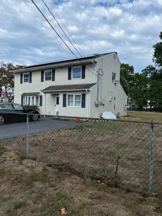 Rent this 3 bed house on 10 Molloy Street in Copiague, NY 11726