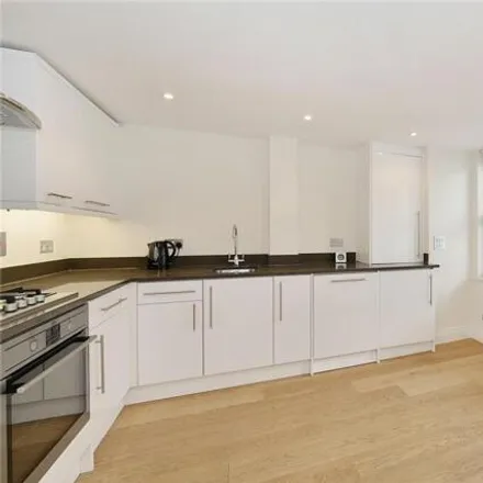 Rent this 2 bed townhouse on Travers House in Trafalgar Grove, London