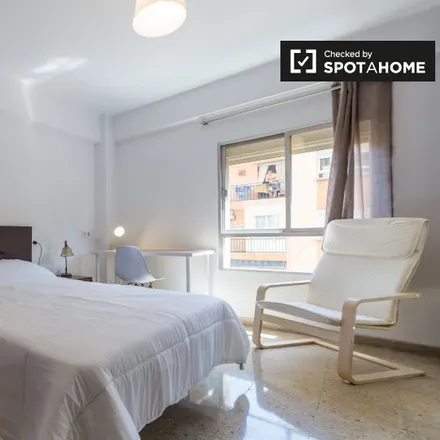 Rent this 6 bed room on Carrer de Rubén Vela in 46006 Valencia, Spain