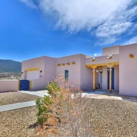 Buy this 3 bed house on Dos Arroyos Trail in Taos, NM 87571