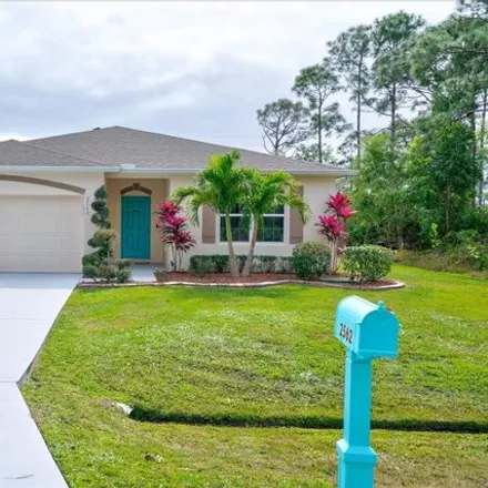 Buy this 4 bed house on 2566 Southeast Tiffany Avenue in Port Saint Lucie, FL 34952