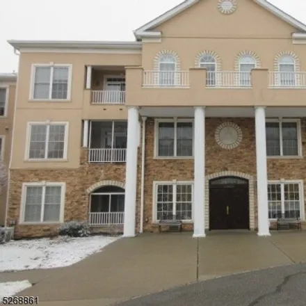Buy this 2 bed townhouse on Carter Drive in Rockaway Township, NJ 07866