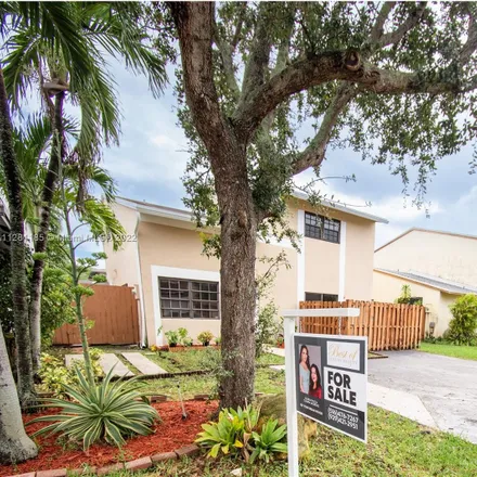 Buy this 4 bed house on 14724 Southwest 106th Terrace in Miami-Dade County, FL 33196