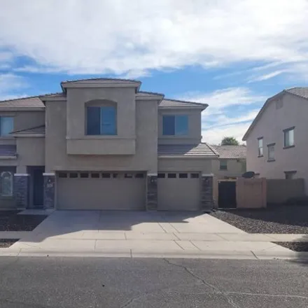 Rent this 5 bed house on 14235 West Banff Lane in Surprise, AZ 85379