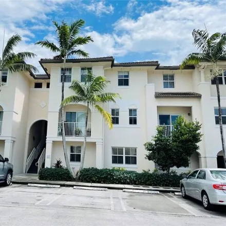 Rent this 3 bed condo on 11601 NW 89th St Apt 106 in Doral, Florida