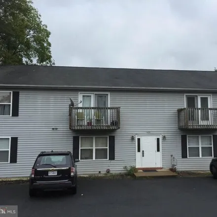 Rent this 2 bed apartment on 385 South Church Street in Woodstock, VA 22664