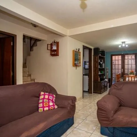 Buy this 3 bed house on Rua João de Paula Cordeiro Filho 486 in Novo Mundo, Curitiba - PR