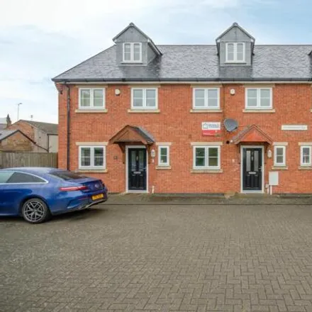 Buy this 4 bed townhouse on Morton Gardens in Lower Hillmorton Road, Rugby