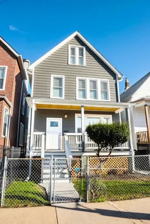 Buy this 4 bed house on 7219 South Ellis Avenue in Chicago, IL 60619