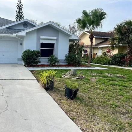 Buy this 2 bed house on 1929 Golfside Village Drive in Lehigh Acres, FL 33936