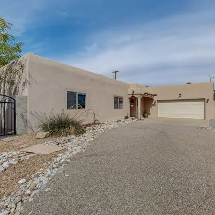 Buy this 3 bed house on 1899 Lafayette Drive Northeast in Albuquerque, NM 87106