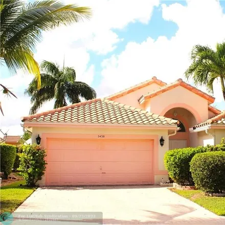 Buy this 3 bed house on 5865 Northwest 122nd Drive in Heron Bay South, Coral Springs