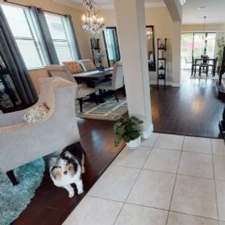 Buy this 5 bed apartment on 2619 Grand Lakeside Drive in Cypress Pointe, Palm Harbor