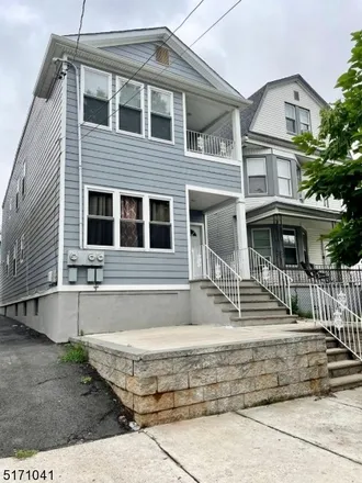 Buy this 6 bed townhouse on 176 Maple Avenue in Irvington, NJ 07111