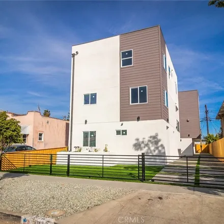 Rent this 4 bed house on 1816 Carmona Avenue in Los Angeles, CA 90019