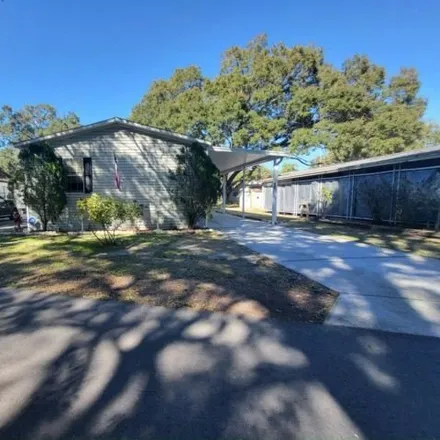 Buy this studio apartment on Lake Drive in Angelina Pines, Hillsborough County