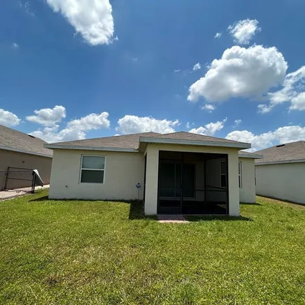 Rent this 3 bed apartment on 10360 Silver Pond Lane in Lehigh Acres, FL 33936