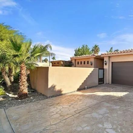 Rent this 4 bed house on 53886 Avenida Ramirez in La Quinta, CA 92253
