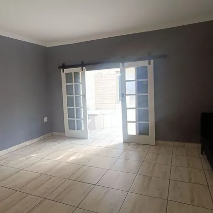 Rent this 2 bed apartment on Maraboe Avenue in Rooihuiskraal, Golden Fields Estate