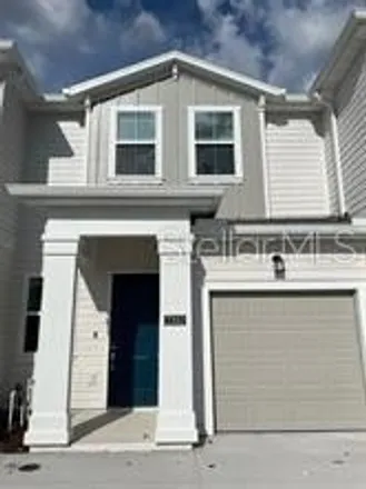Rent this 3 bed townhouse on Brookmarsh Loop in Osceola County, FL 34747
