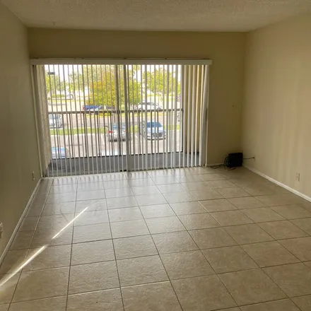 Rent this 2 bed apartment on 1522 Southeast Royal Green Circle in Port Saint Lucie, FL 34952