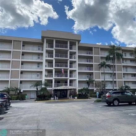 Buy this 2 bed condo on Palms Course in South Course Drive, Pompano Beach