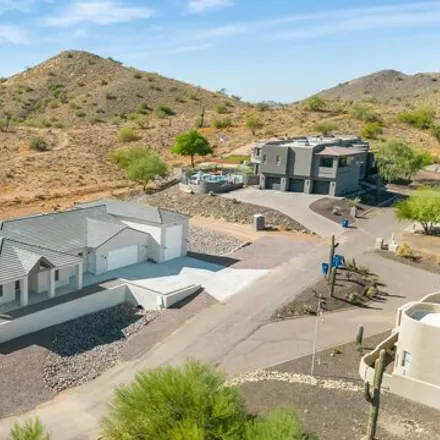 Buy this 5 bed house on 51 West Night Glow Drive in Maricopa County, AZ 85085