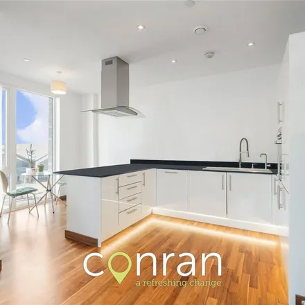 Rent this 2 bed townhouse on Gooch House in 2 Telcon Way, London