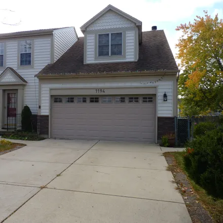 Buy this 4 bed house on 1194 Crystal Shore Drive in Carol Stream, IL 60188